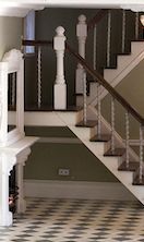 David Bivens has used BS5 spiral spindles to make this fine staircase in a hall with PF4 and OM11 fireplace set